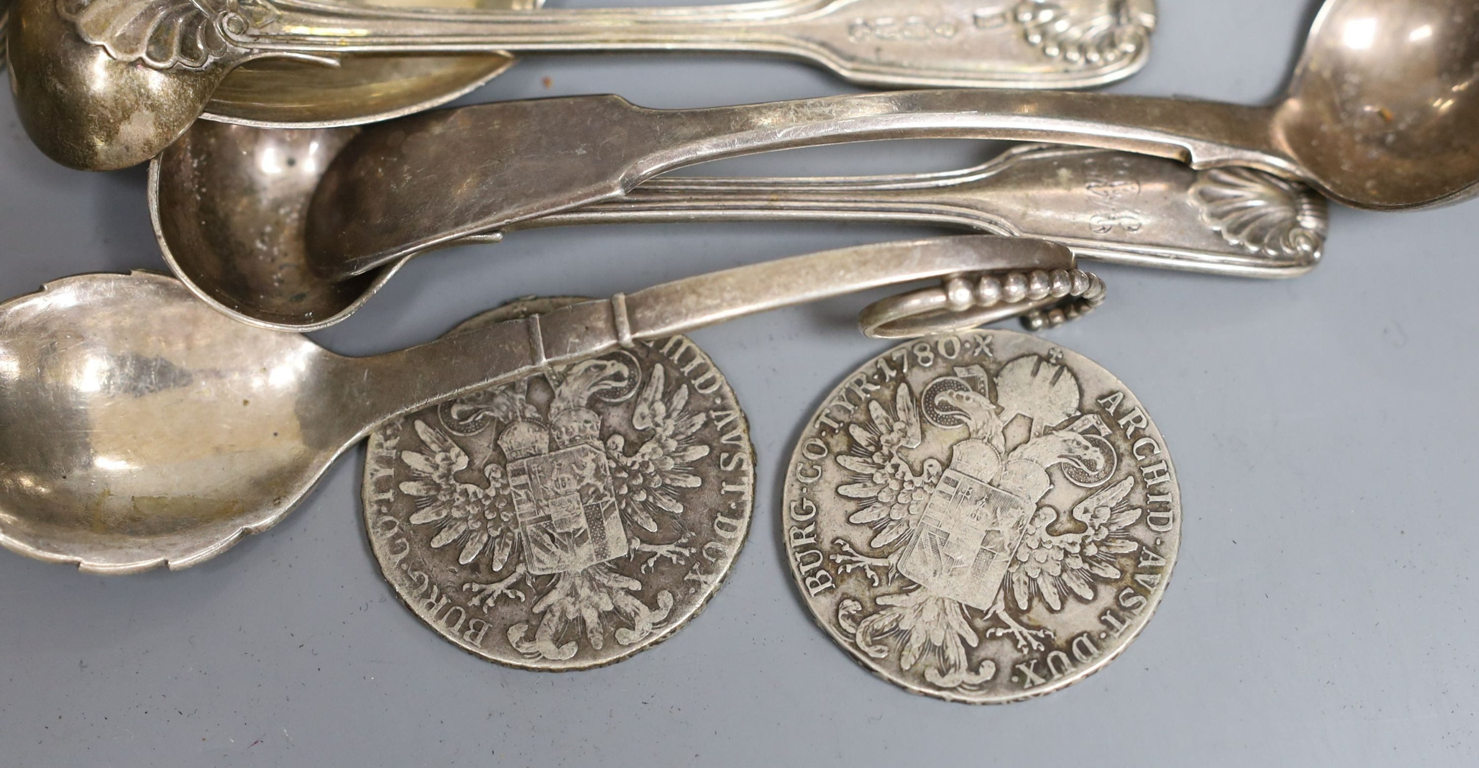 Assorted small silver including flatware, napkin rings, tortoiseshell mounted inkwell, two coins and a Georg Jensen sterling preserve spoon, no. 41.